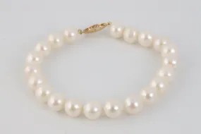 7.5" 14k Yellow Gold and Pearl Bracelet (16.29g.)