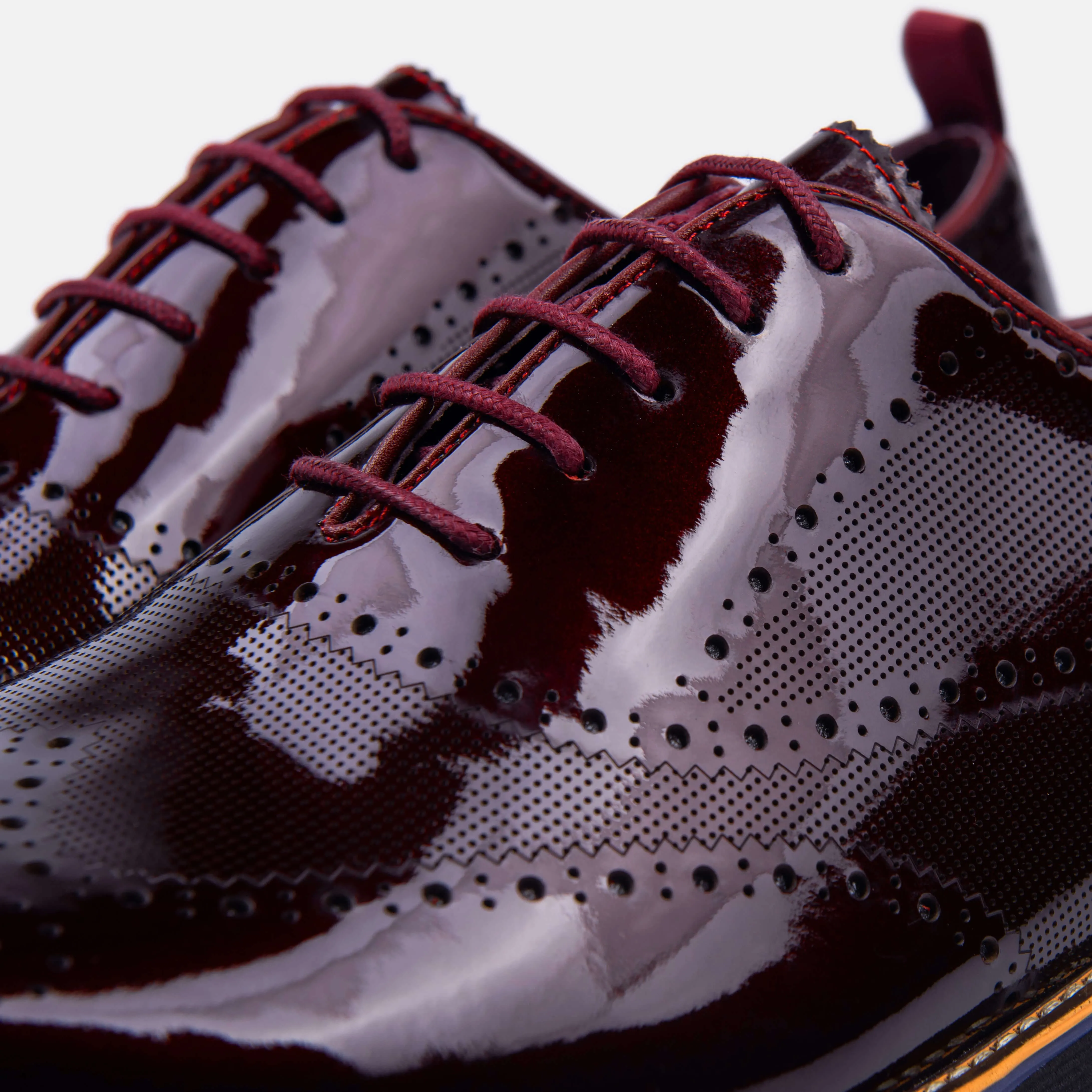 Oscar Burgundy Patent Leather Wholecut Brogue Sneakers